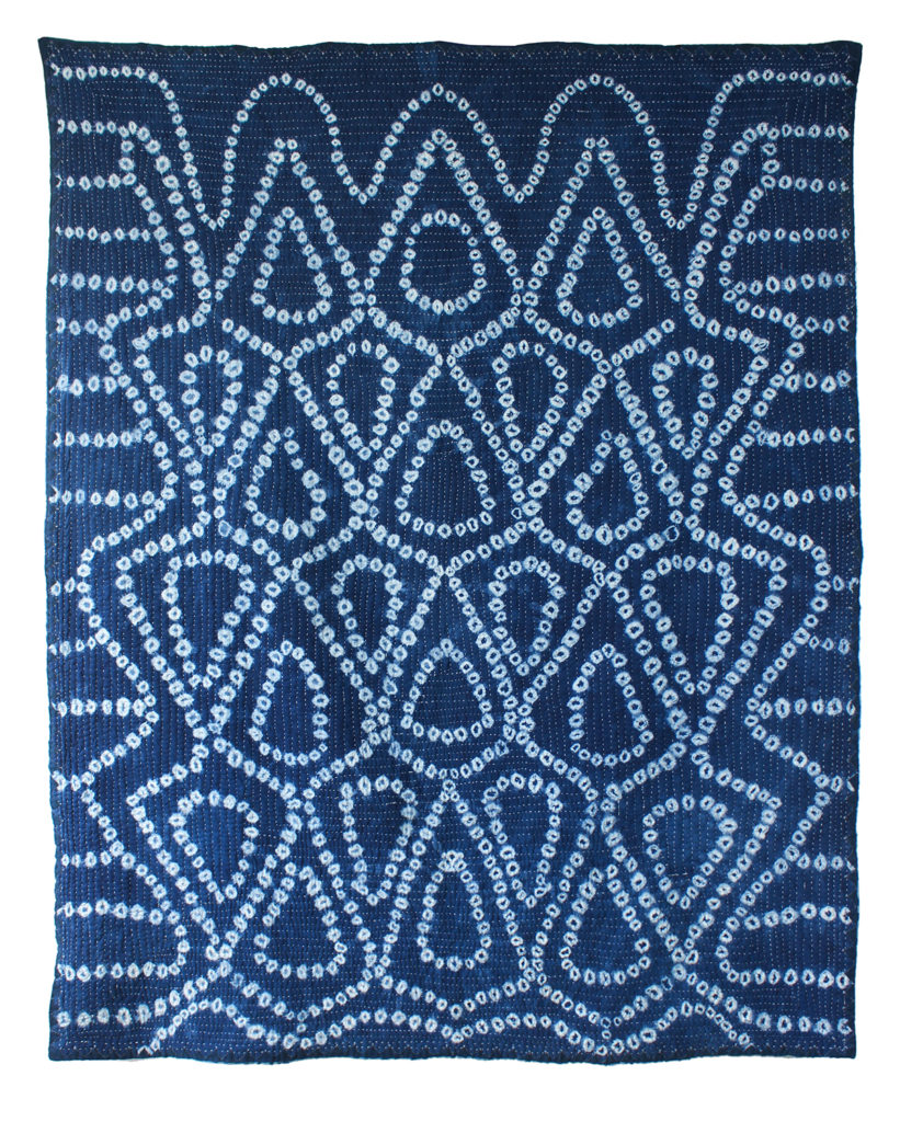 hand-stitched, indigo, tie-dye quilt