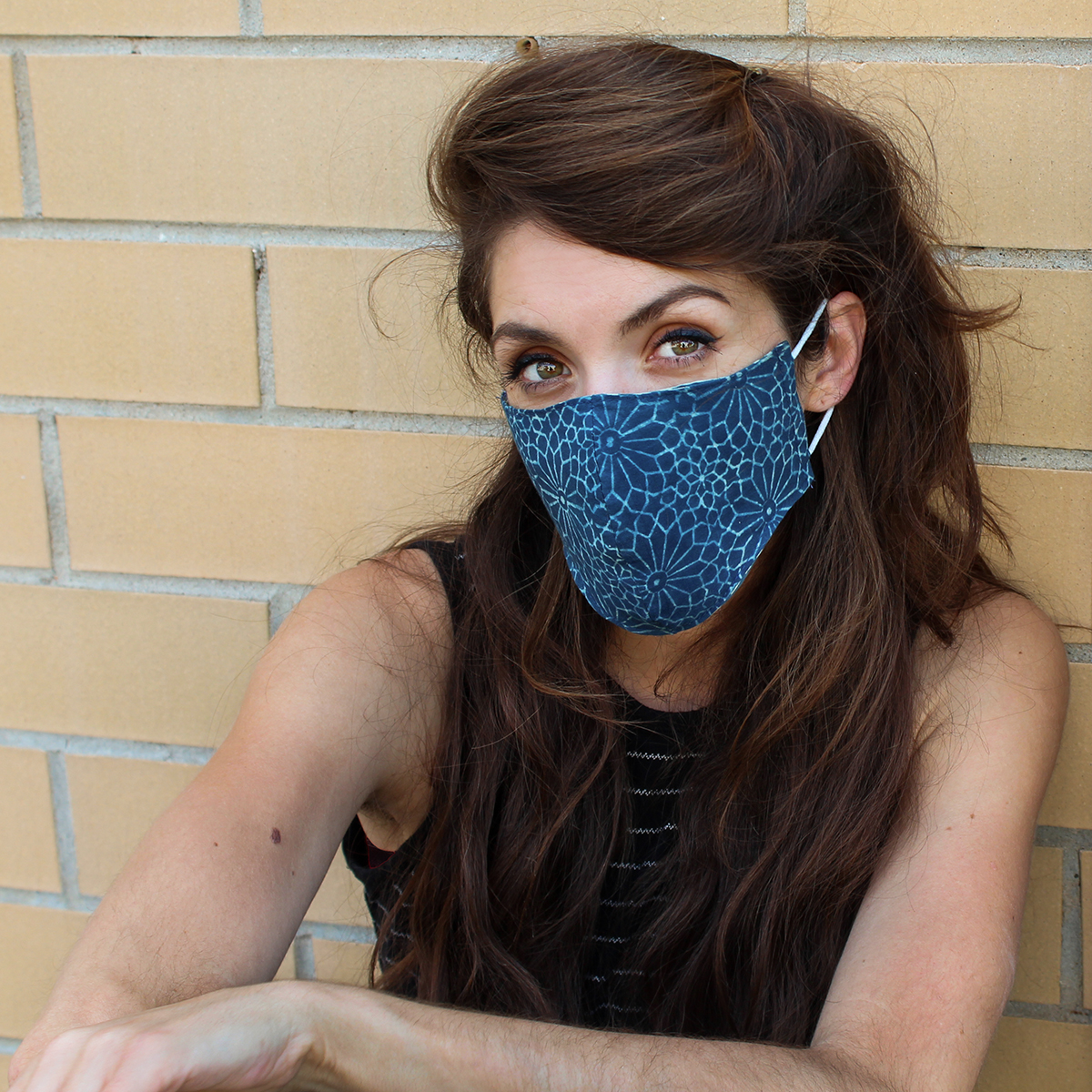 indigo dyed Cotton face mask with filter pocket on female model