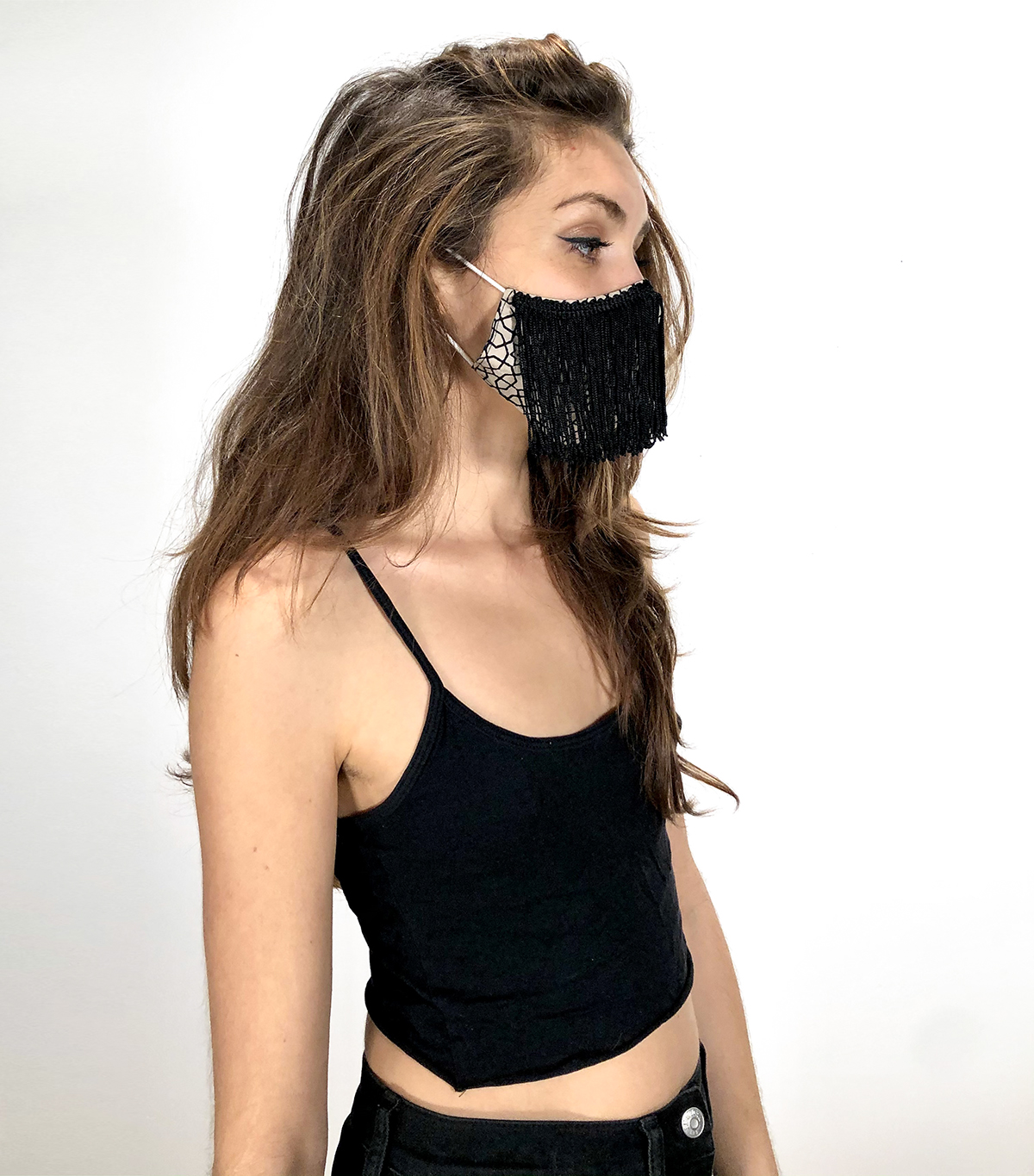 Face covering mask with Black fringe on female model